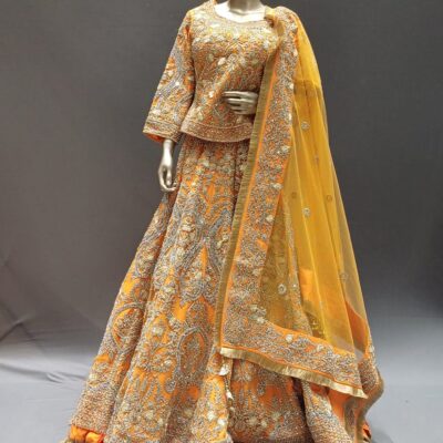 Orange Raw Silk Lehenga Choli with Kasab, zardozi & Mirror Hand Work - Wedding wear