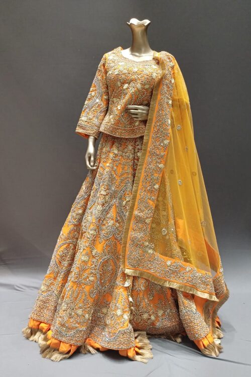 Orange Raw Silk Lehenga Choli with Kasab, zardozi & Mirror Hand Work - Wedding wear